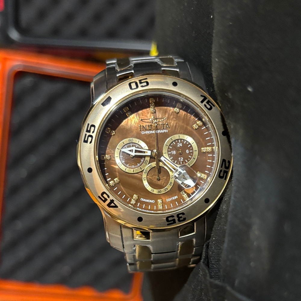 Invicta Pro Diver SCUBA Men’s 48mm Diamond Mother-of-Pearl Watch – Model 42109